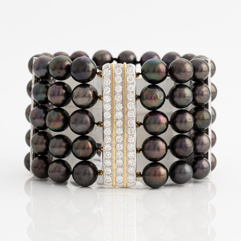 Bracelet and necklace, cultured black pearls, gold and white gold with brilliant-cut diamonds.