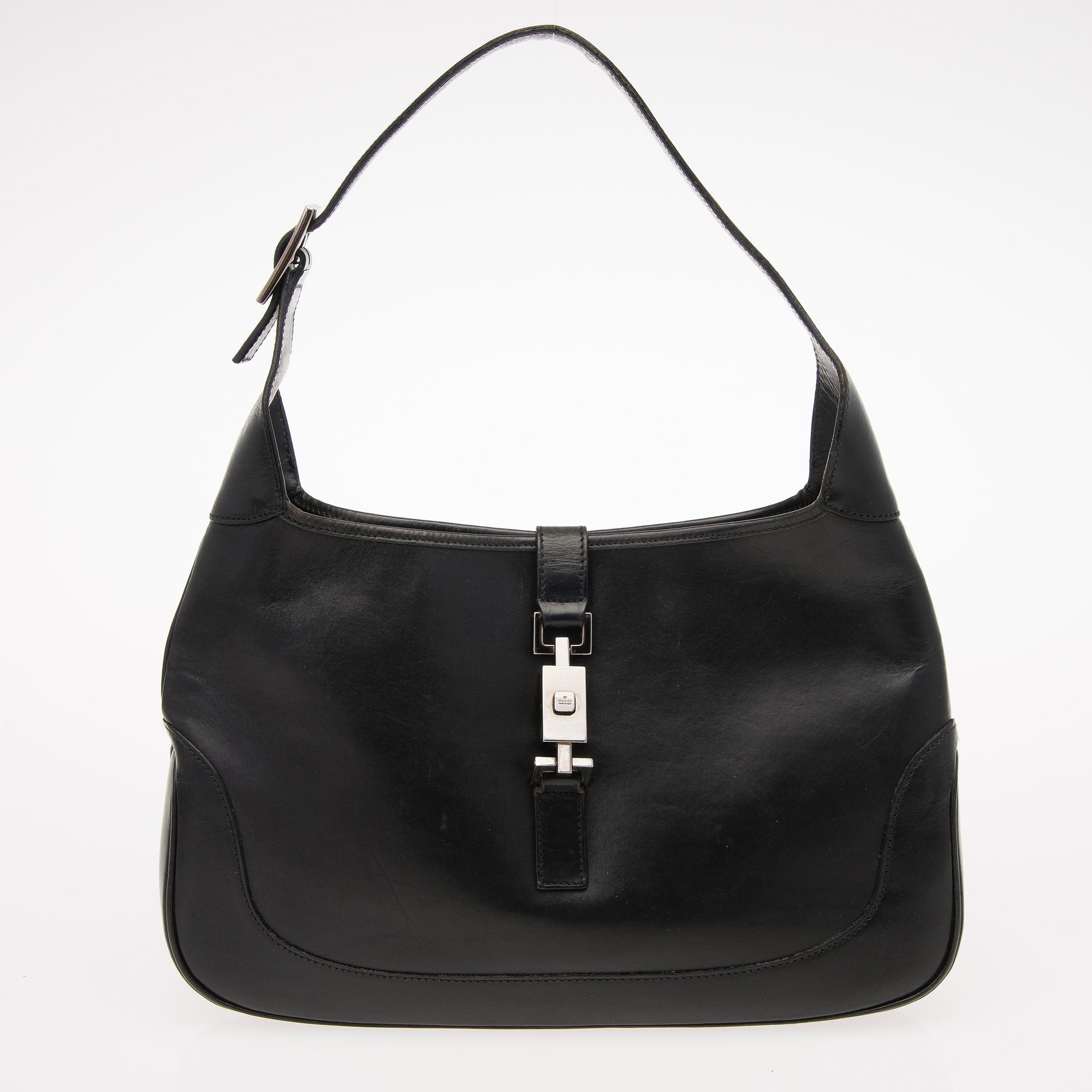 A Black Leather Jackie Bag.