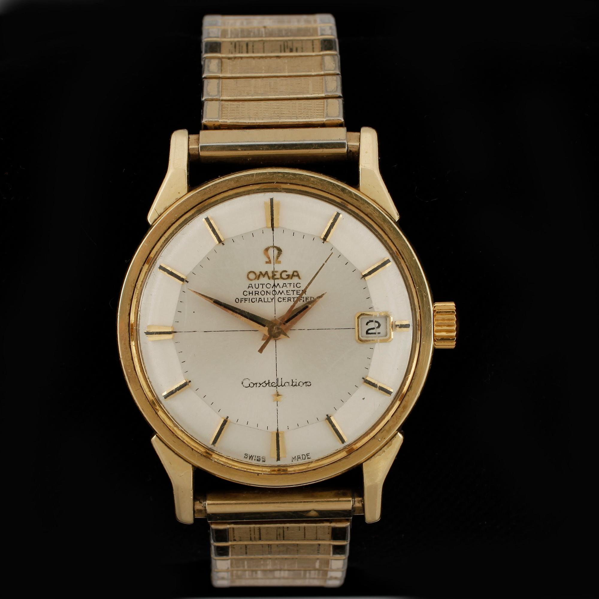 HERRARMBANDSUR, förgyllt stål, Omega Constellation, 1900-talets första hälft.