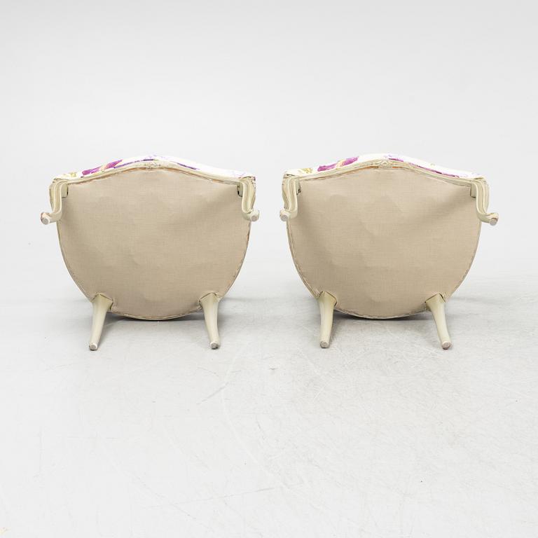 A pair of rococo style armchairs, 20th Century.