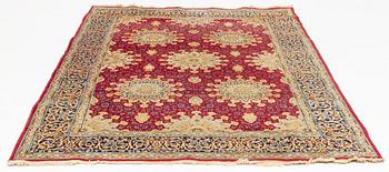 An oriental carpet, c. 290 x 198 cm.