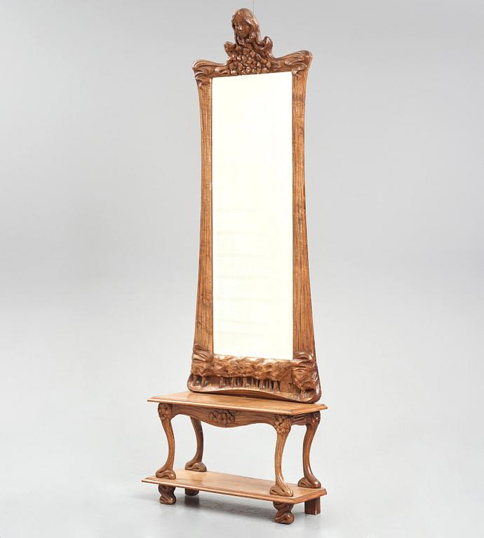 Edvard Nilsson, an Art Nouveau sculptured mirror with table, Sweden , early 20thC.