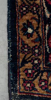 A carpet, an antique/a semi-antique Yezd, ca 557-562 x 366,5-370,5 cm.
