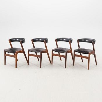 Kai Kristiansen, a set of four walnut chairs mid 1900s.