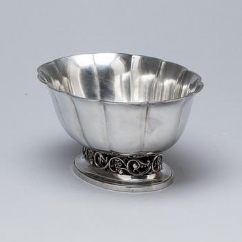 SKÅL, tenn, Just Andersen. 1900-talets första hälft.