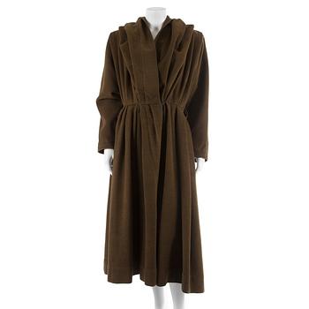 YVE SAINT LAURENT, a green wool and cashmere coat.