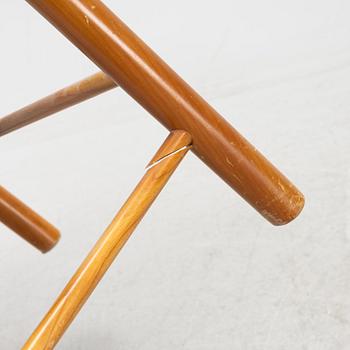 Josef Frank, a model 2238 cherry wood armchair by Firma Svenskt Tenn.