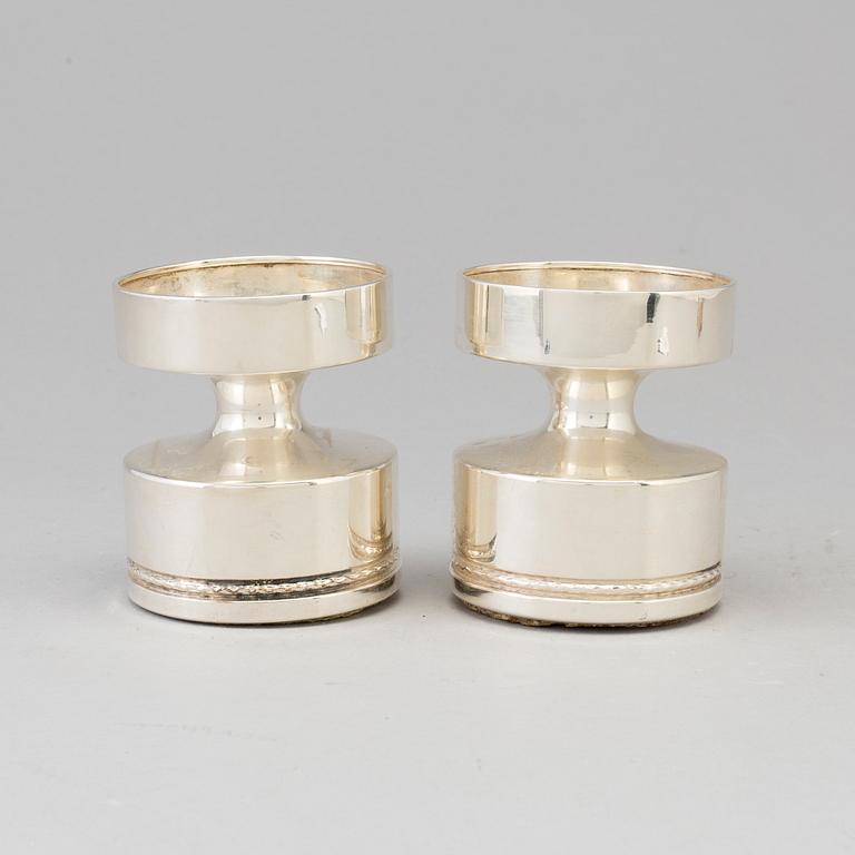 A pair of silver candlesticks by Eric Löfman, MGAB, Uppsala 1973.