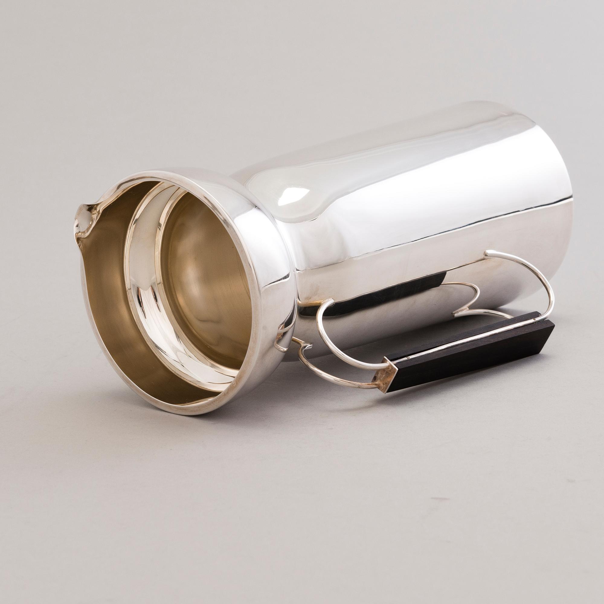 A 1960s silver jug with hardwood handle, Kultateollisuus, Turku Finland 1968.