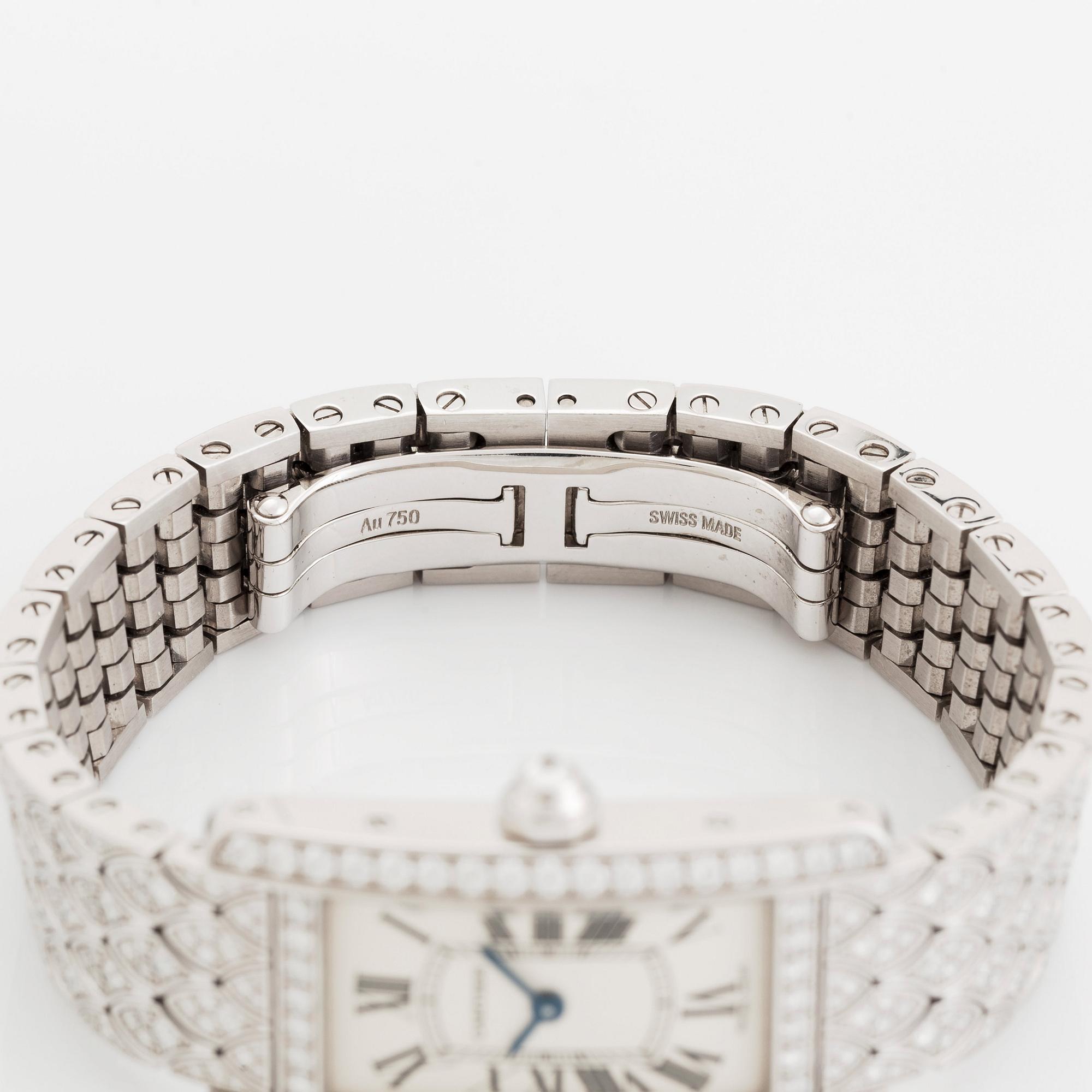 A Cartier "Tank Américane" 18K white gold watch set with round brilliant-cut diamonds.