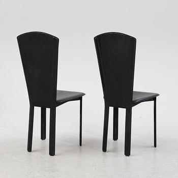 Twelve black leather 'Sossano' chairs, Quia, Italy.