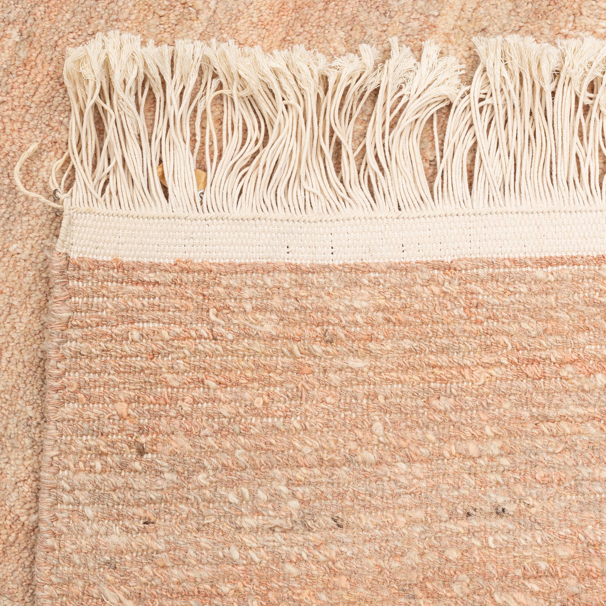 A Chinese carpet, c. 330 x 270 cm.