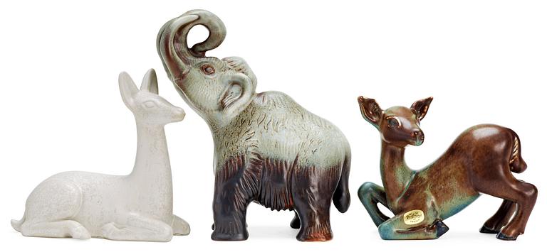 Three Gunnar Nylund stoneware figures, two deer and a mammoth, Rörstrand.