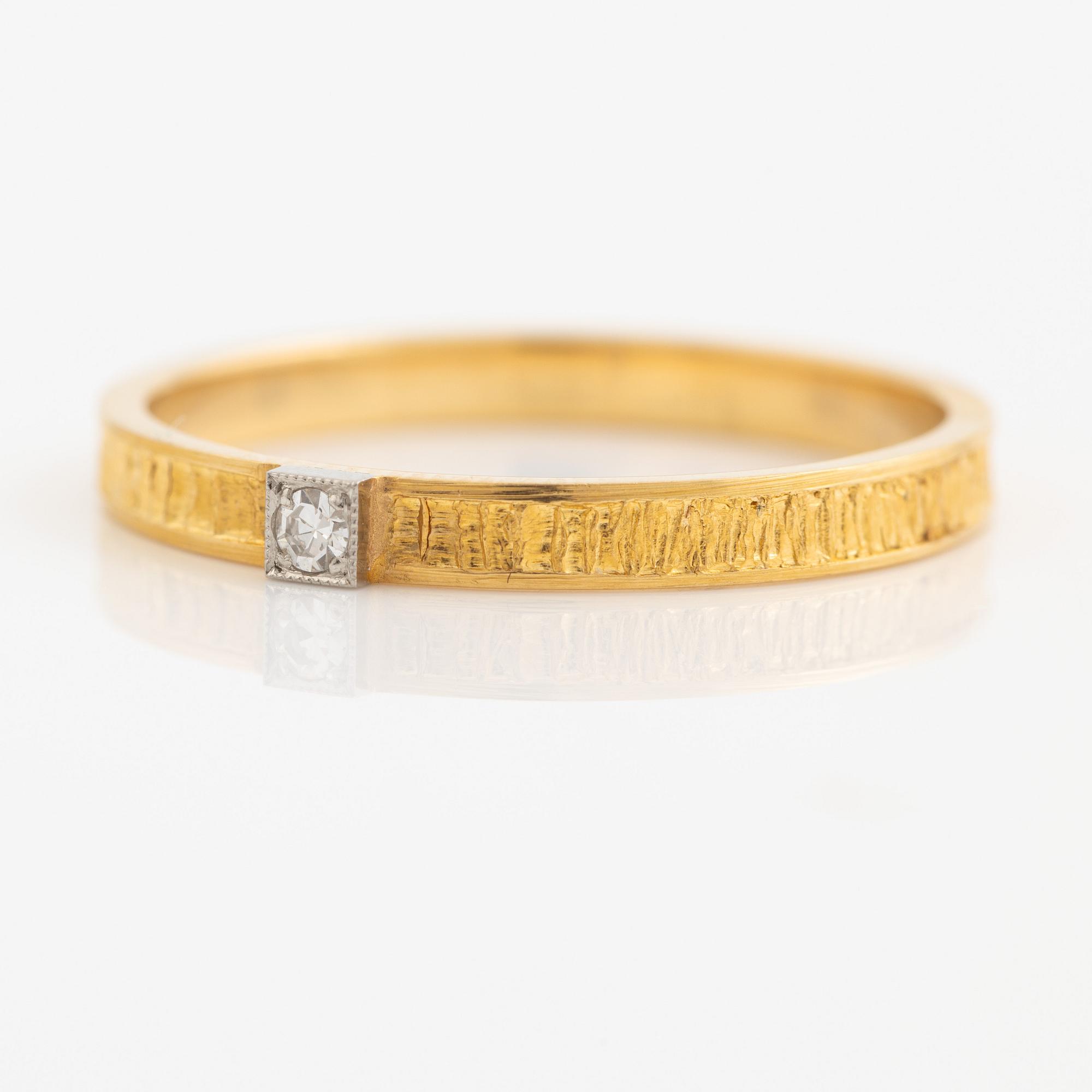 Lapponia ring 18K guld med en åttkantslipad diamant, Finland 1978.