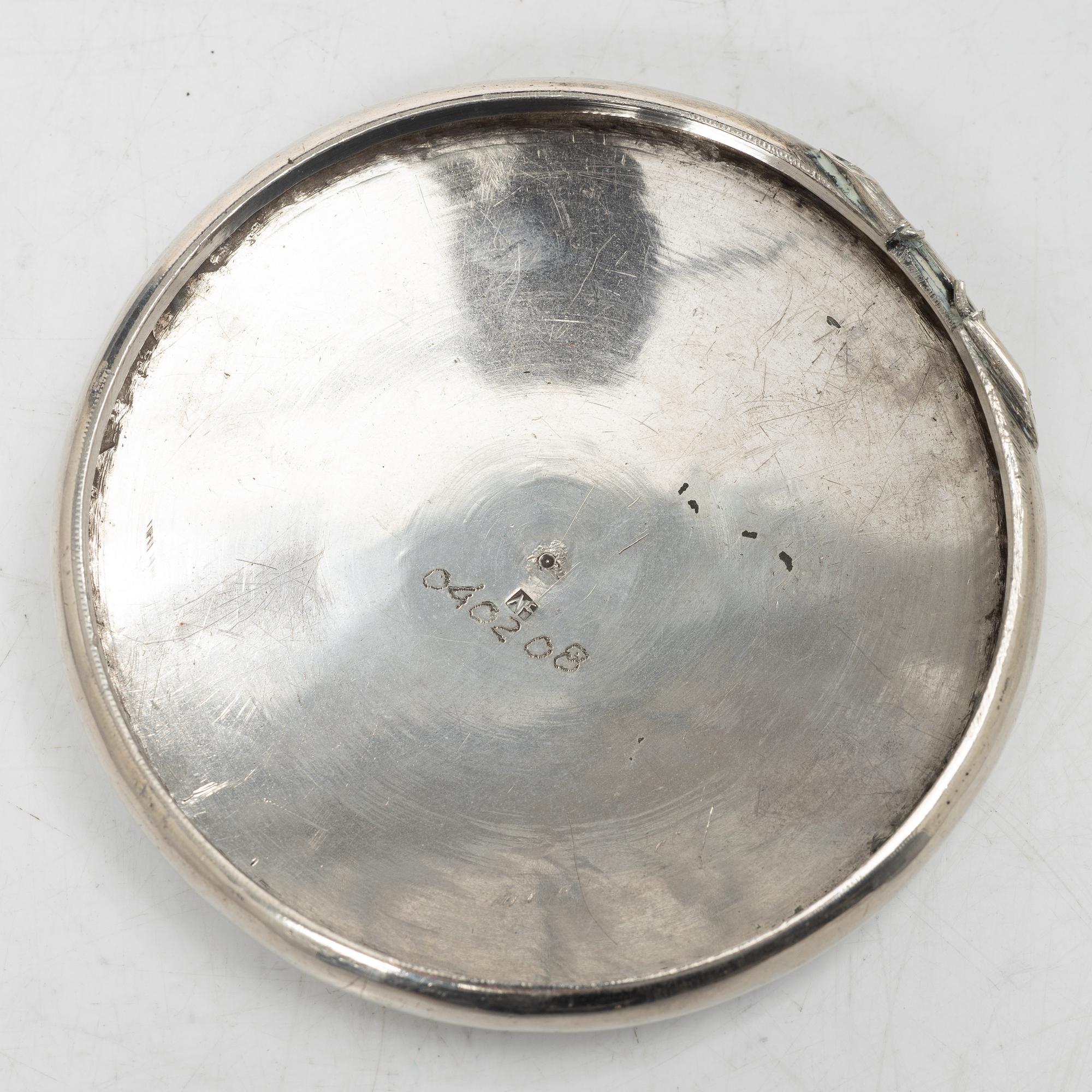 Two silver buttons, a belt buckle, an armring and a box, Persia, first part of the 1900s.