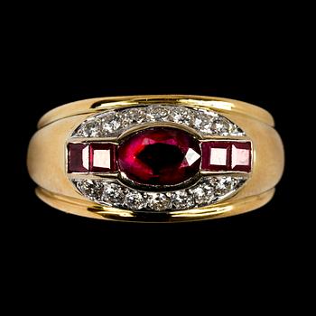 1042. RING, rubiner med briljantslipade diamanter, tot. ca 0.40 ct.