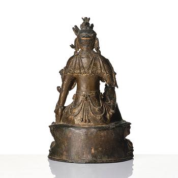 A bronze sculpture of Guanyin, Ming dynasty (1368-1644).