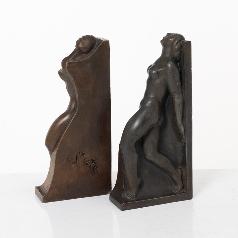 Axel Gute, two patinated metal bookends.