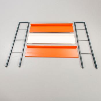 A 1950s  Adriaan Dekker lacquered metal book shelf for Tomato Holland.