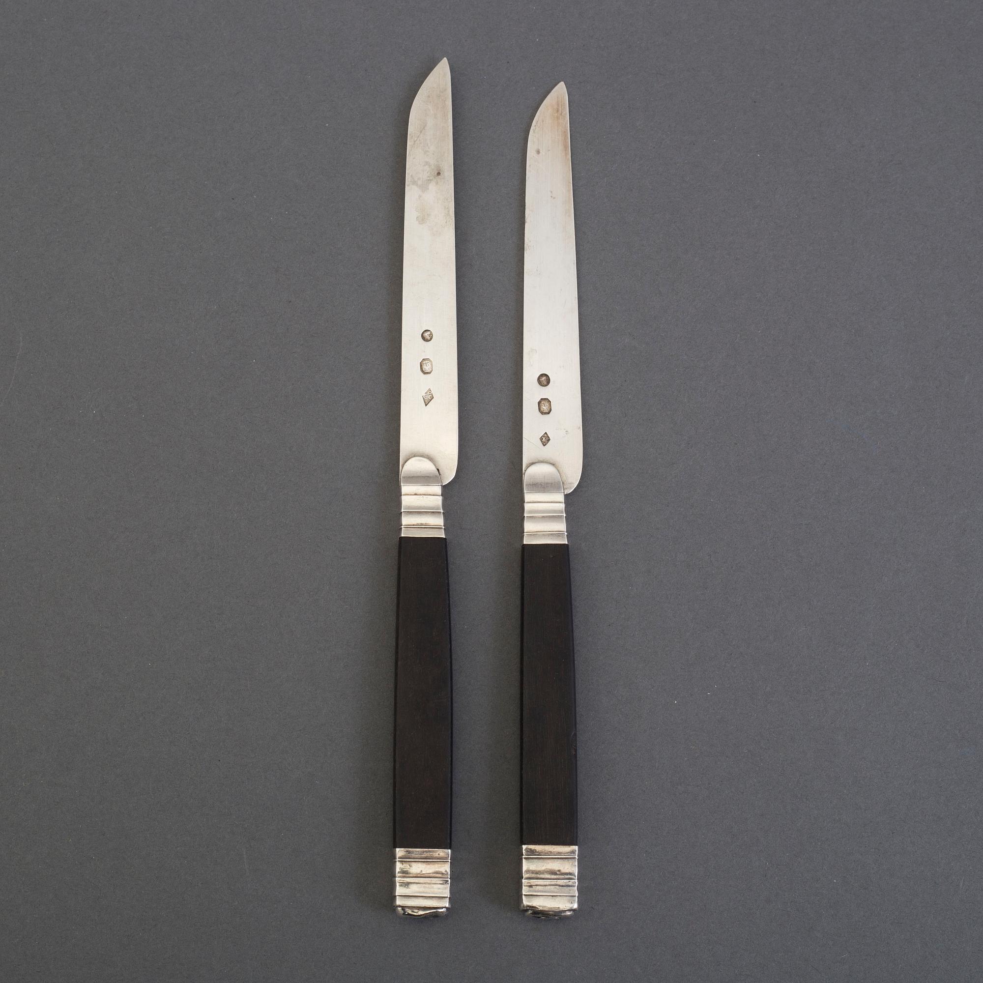 12 French silver and ebony fruit knives, 1809-19.