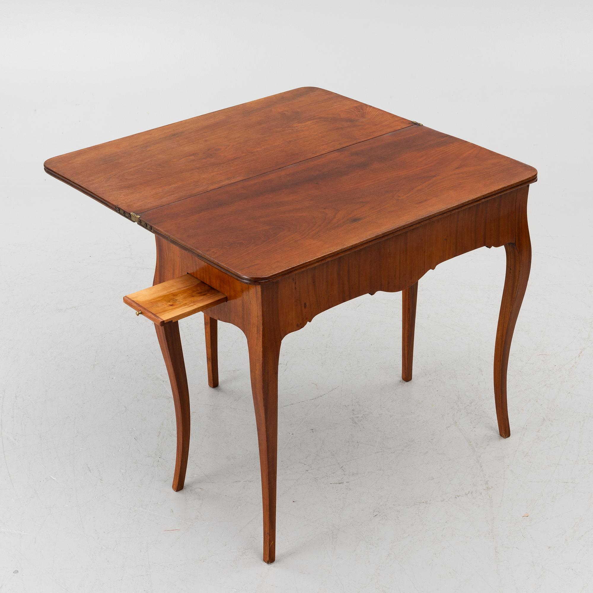 A Rococo game table, 18th century.