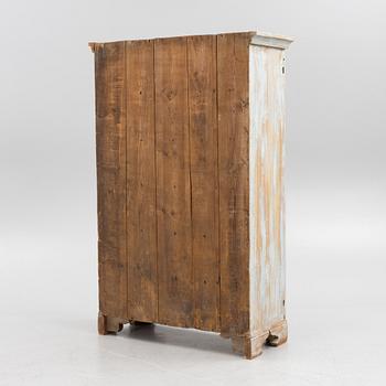 A 19th century cabinet.