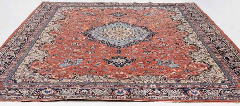 An oriental carpet, c. 370 x 275 cm.