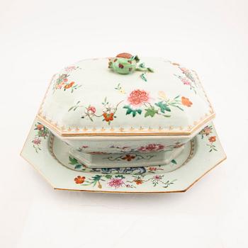 A Chinese famille rose tureen with cover and plate later part of the 18th century.