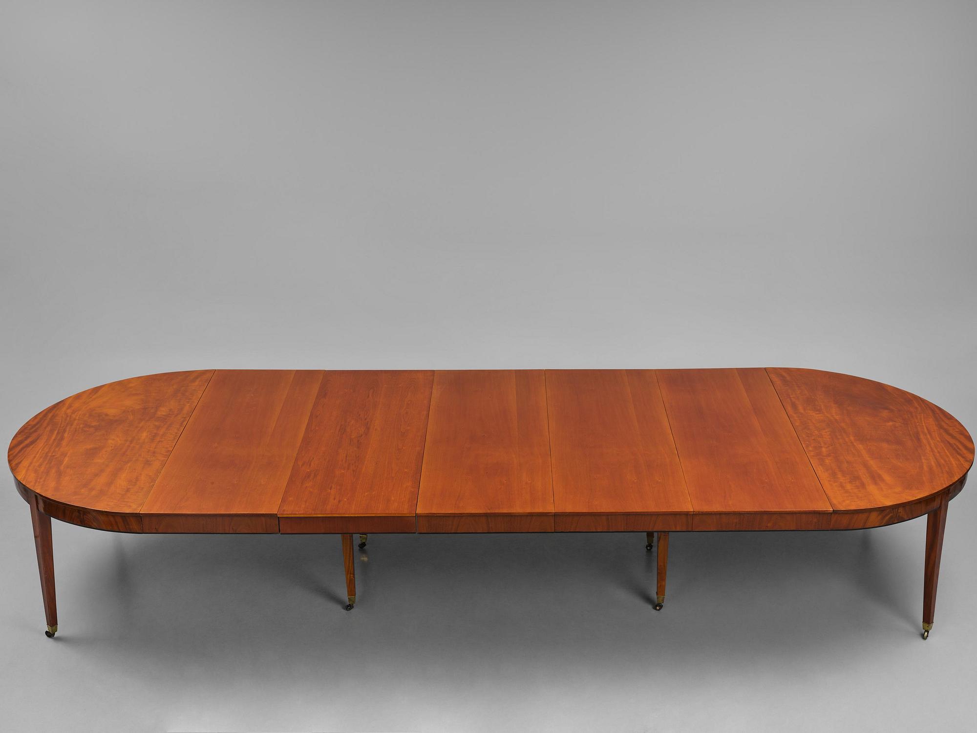 A George III mahogany D-end dining table, circa 1800.