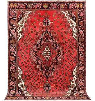 An Azerbaijan carpet, c. 306 x 208 cm.
