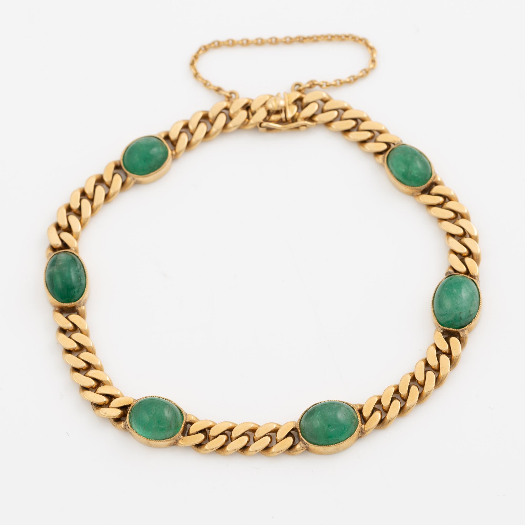 Bracelet in 18K gold with cabochon-cut emeralds, 1920s.
