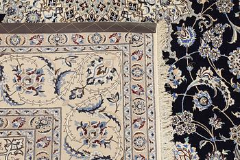 A part silk Nain carpet, so-called 4LAA, approx. 318 x 219 cm.