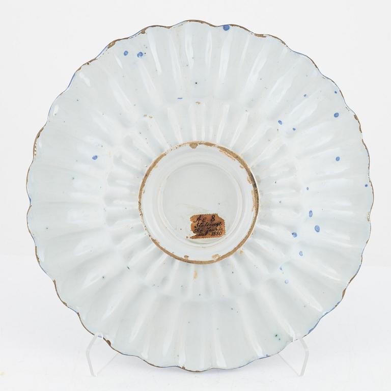 A faiance deep dish, 18th Century.