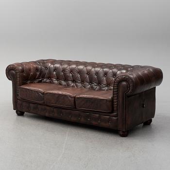 A 20th century leather upholstered Chesterfield sofa by Rubelli.