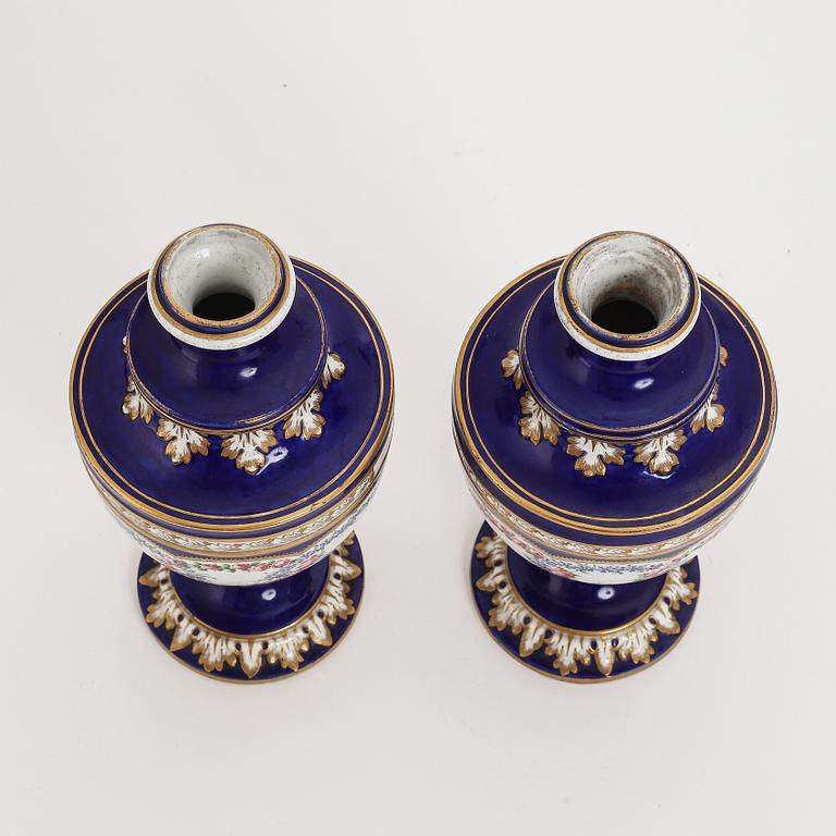 A pair of French porcelain vases, 19th Century. Sèvres style mark.