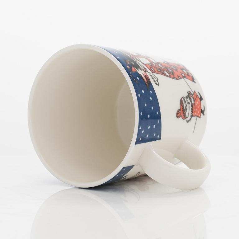A Moomin Finnair 75 Anniversary mug, vitro porcelain, Moomin Characters, Arabia, Finland 1998.