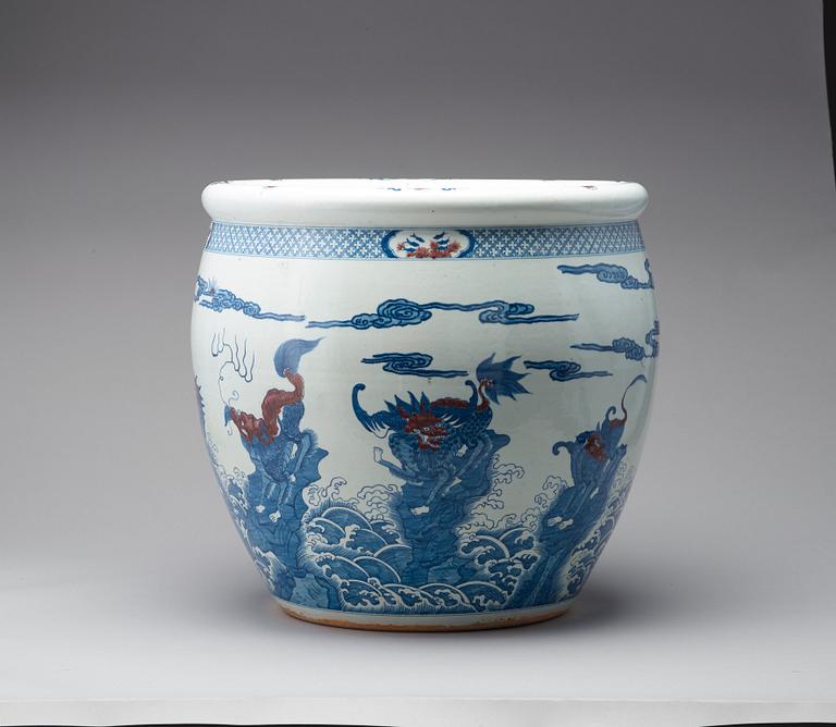 A pair of massive Chinese blue and white and red basins, 20th Century.