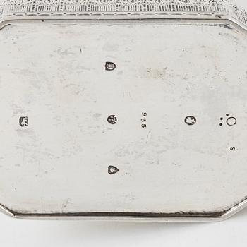 An English silver coffee-pot and a silver teapot, marks of Walter & John Barnard, London 1878.
