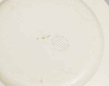A set of nine French dinner plates, early 19th Century.