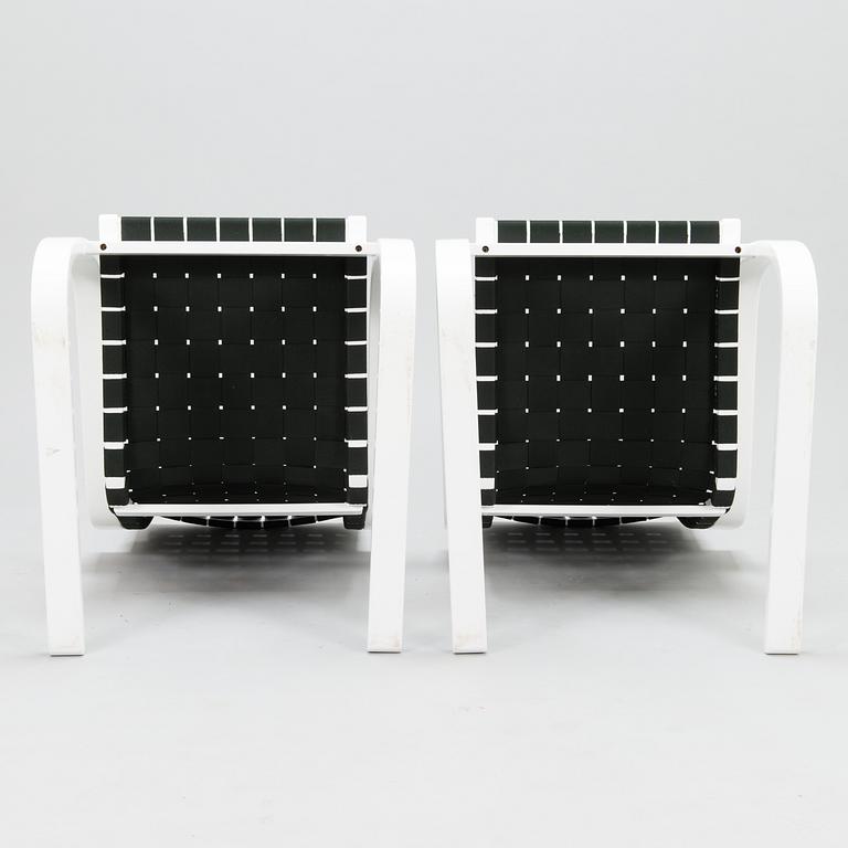 ALVAR AALTO, a pair of late 20th century '406' armchairs for Artek.