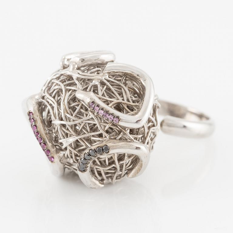 Sterling silver ring with pink sapphires.