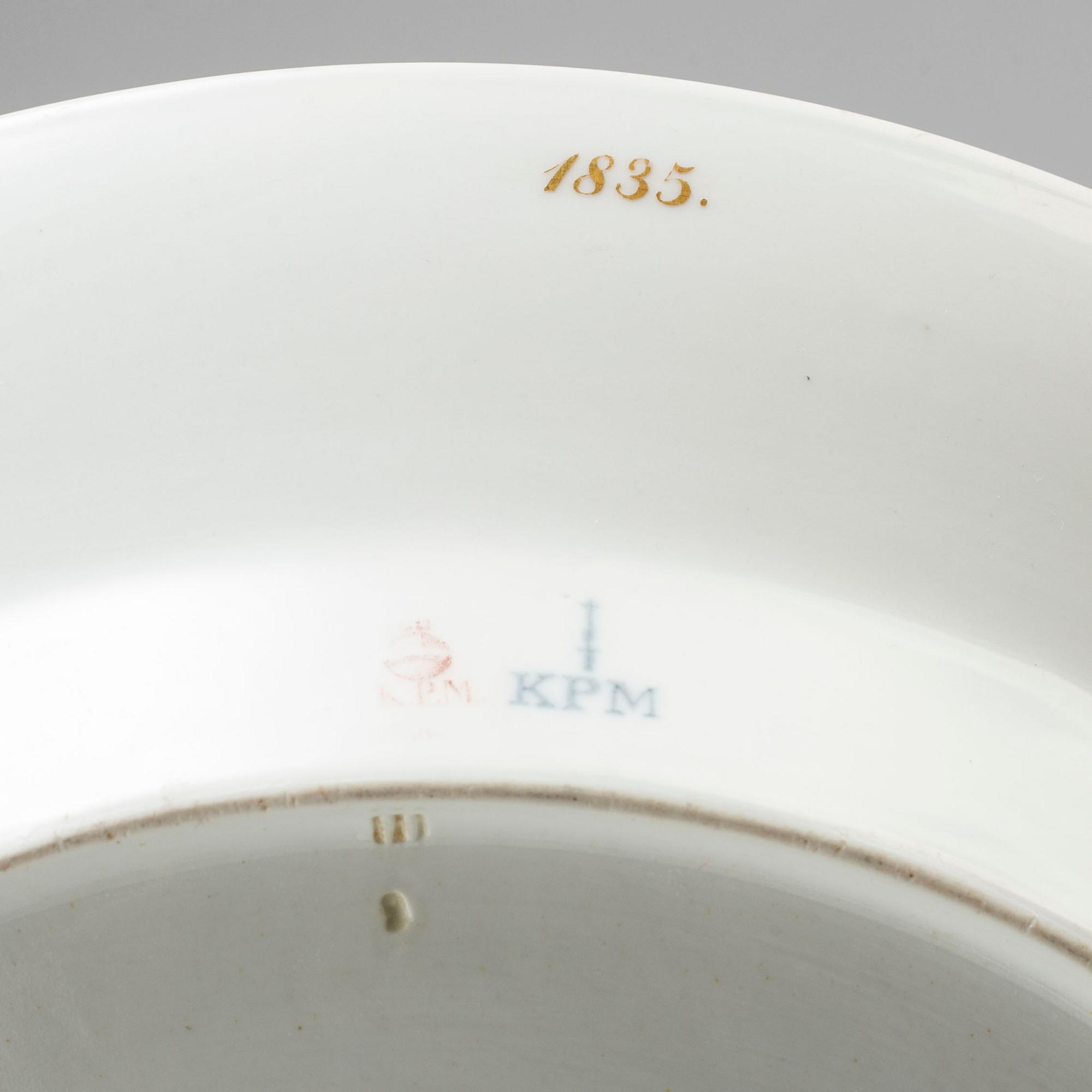 A first half of the 19th century porcelain plate and sauce boat, KPM, Berlin, Germany.