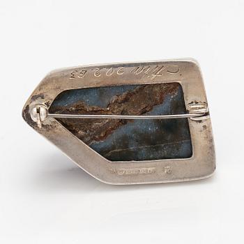 Helge Narsakka, A silver brooch with an amethyst. For Kaunis Koru. Lahti 1963.