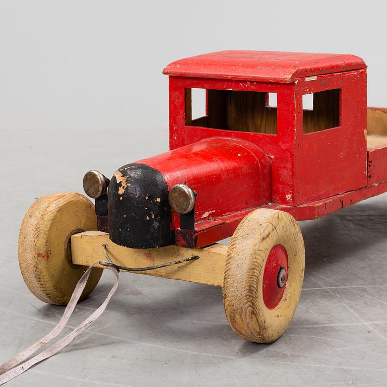 A TOY CAR, mid 1900s.