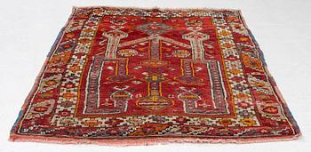 A semi-antique Anatolian rug, possibly Konya, approximately 152 x 117 cm.