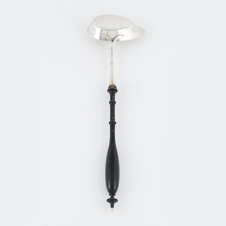 A Swedish Silver Ladle, mark of Adolf Öström, Piteå 1887 and a pair of Silver Candlesticks.