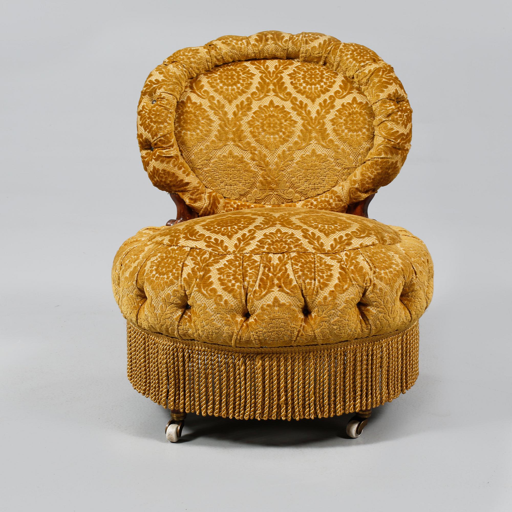 FÅTÖLJ, tapetserarstil, sent 1800-tal.
