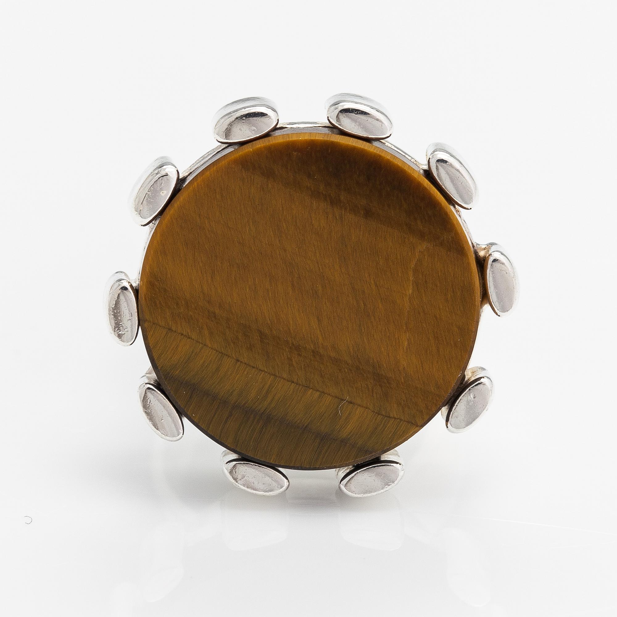H Palmberg, A sterling silver ring with a tiger's eye. Alton, Falköping 1975.