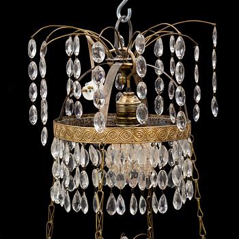 A gustavian style chandelier, circa 1900.