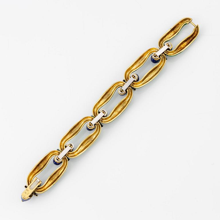 Armband 18 guld med emalj och runda briljantslipade diamanter, Spritzer & Fuhrmann.